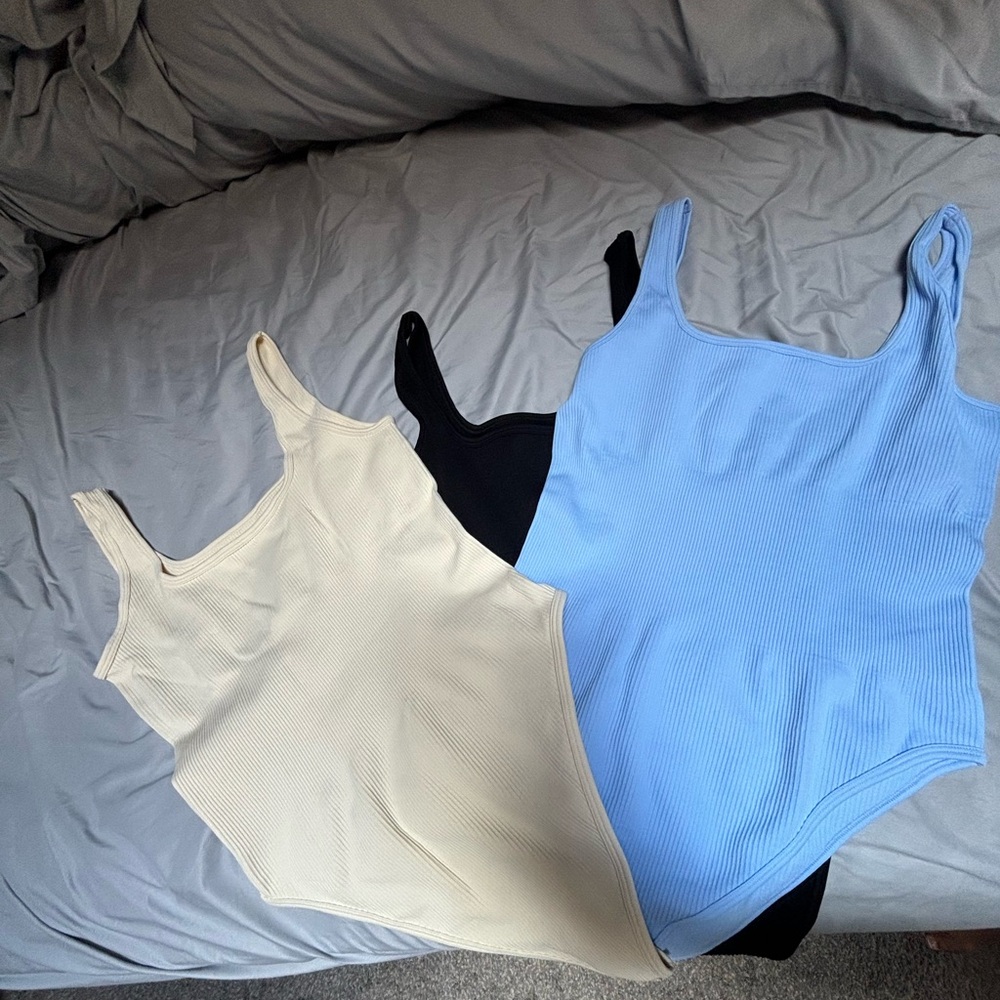 3 brand new without tags women’s body suits